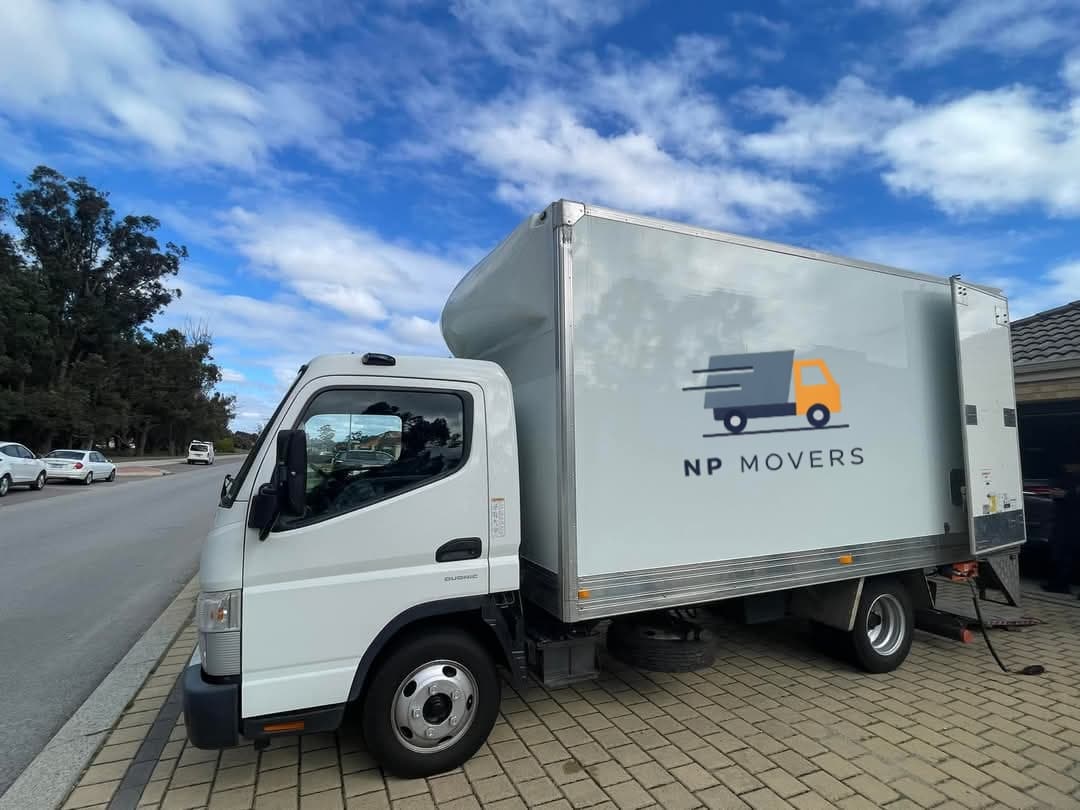 NP Movers Perth professional moving team with truck