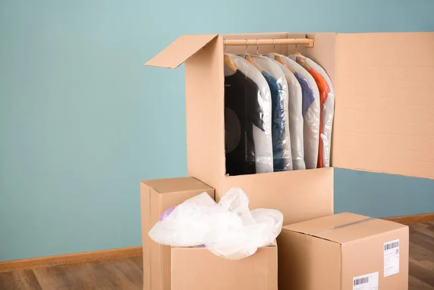 Use wardrobe boxes for hanging clothes